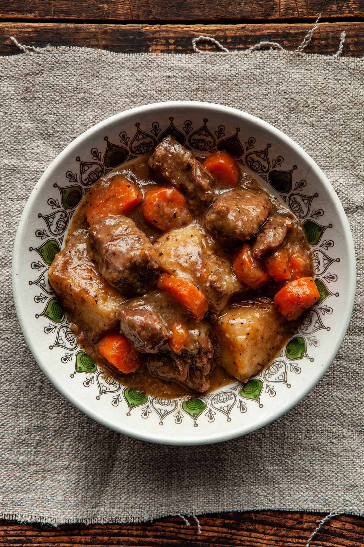 Close up overhead image of a bowl of Dutch oven beef stew.