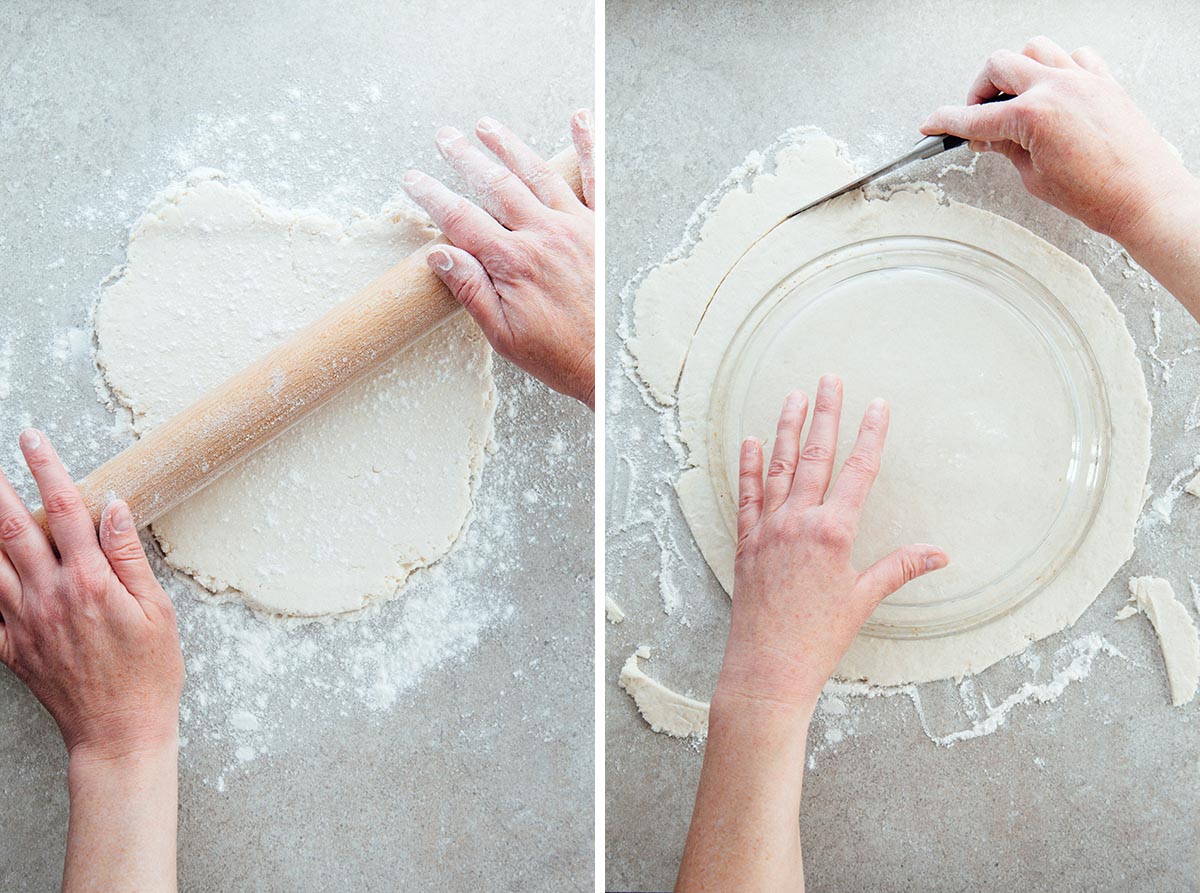 Hands rolling pie dough and cutting the edges to fit into a pie plate.