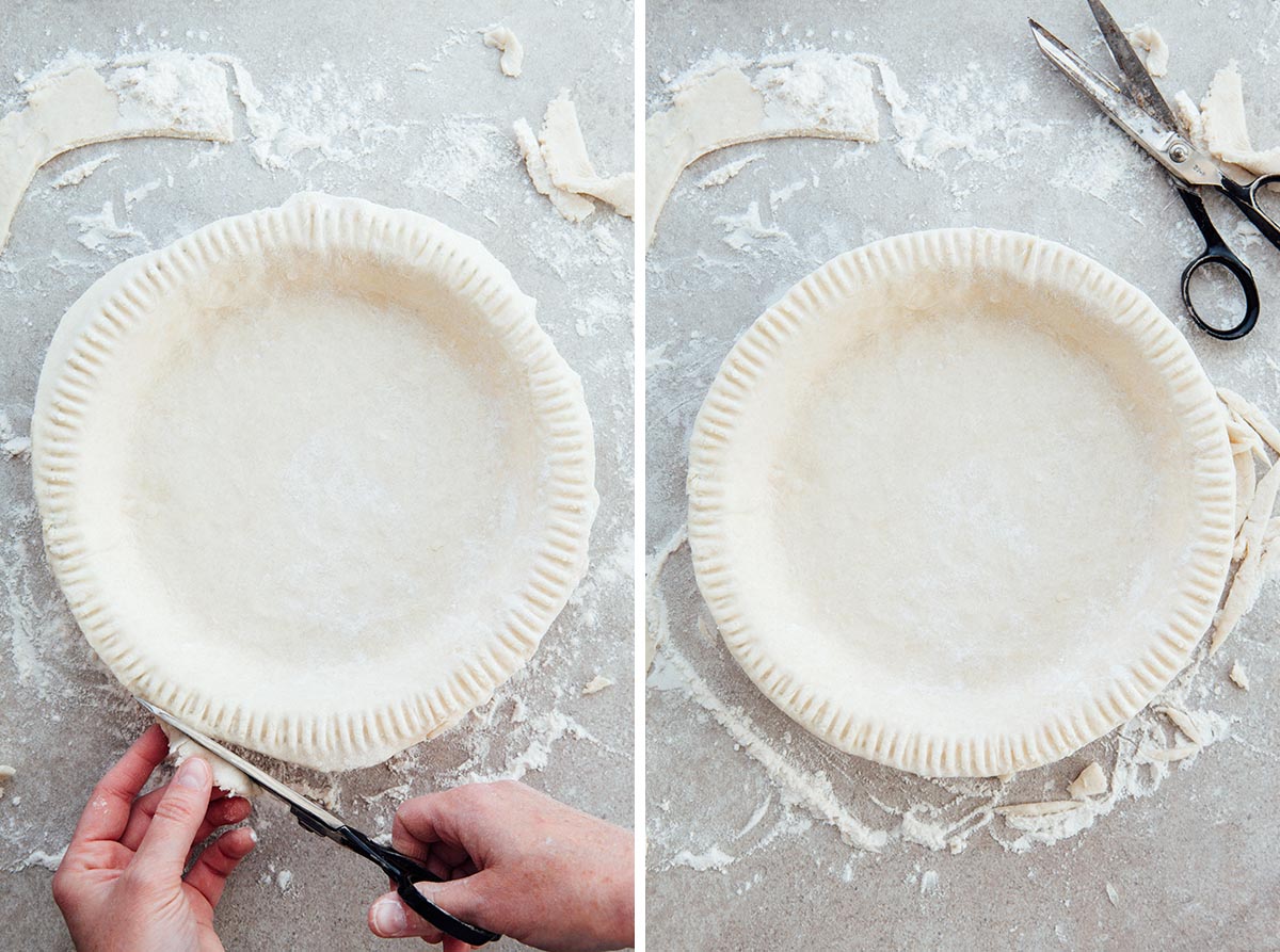 Hands using scissors to trim the edges of a pie crust.