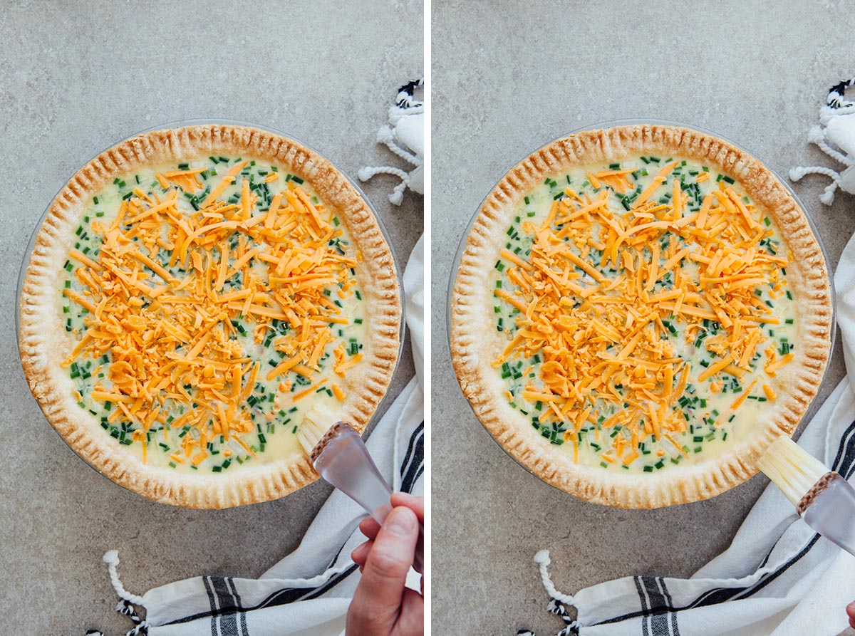 Brushing the edges of a quiche with egg wash.