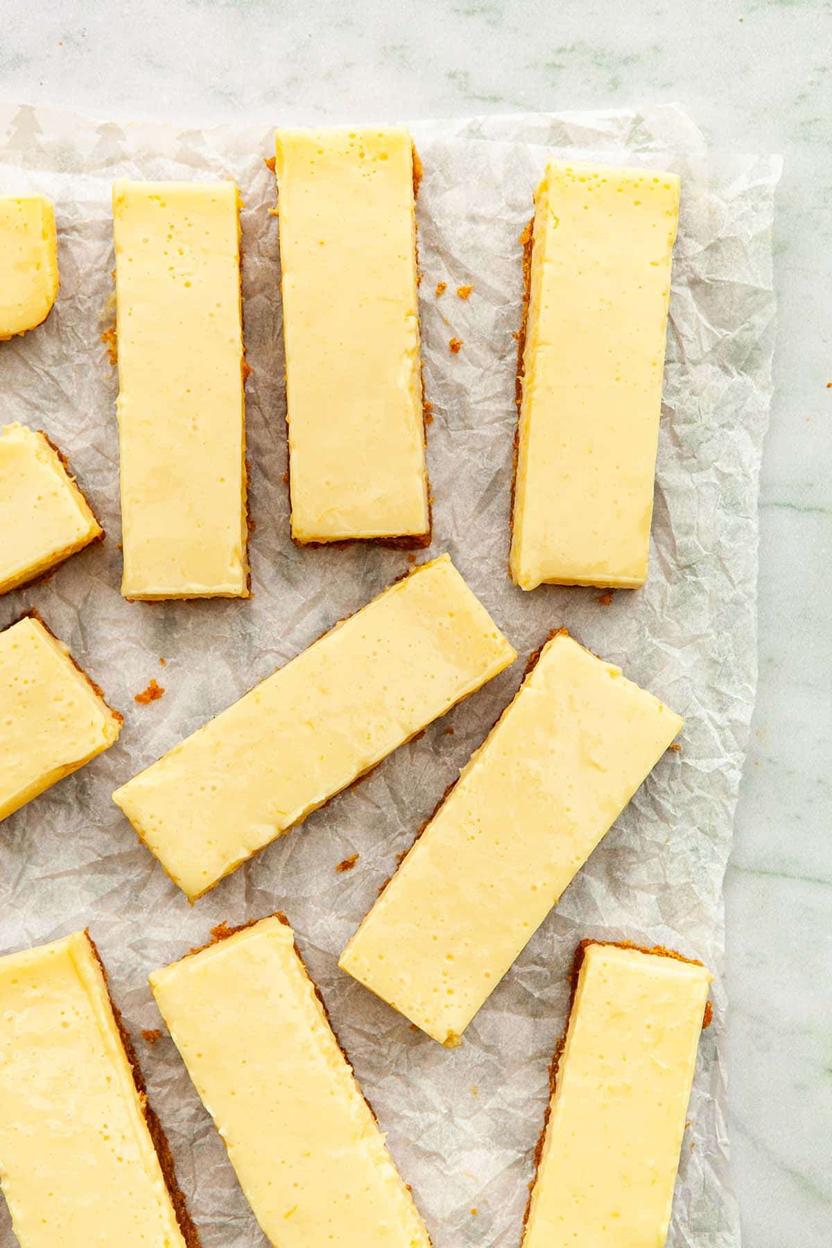 Condensed milk lemon slices on parchment paper.